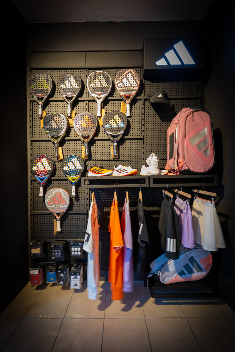 Adidas brand wall — rackets, bags and apparel