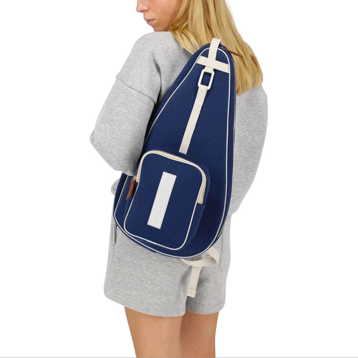 Osaka Neoprene Padel Sleeve - Navy - crossbody carrying view