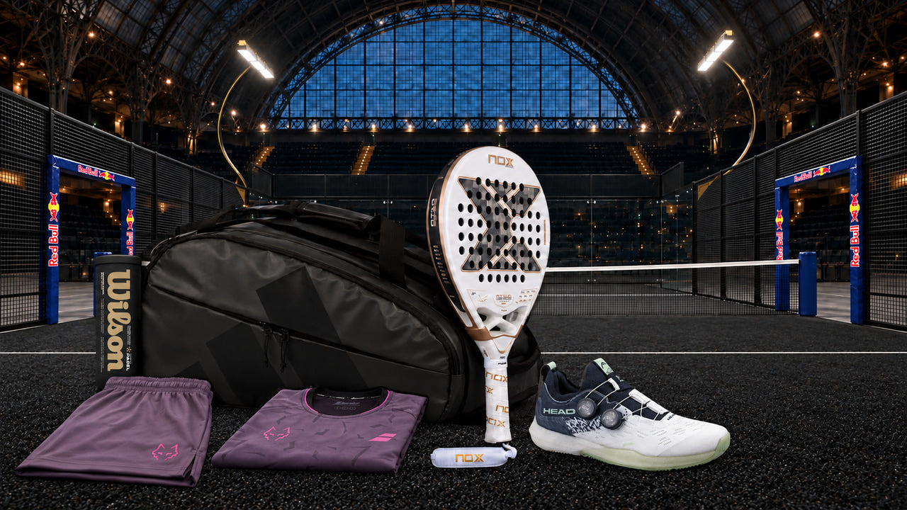A full padel kit with shoes, a racket, a bag, clothing and balls on an indoor court